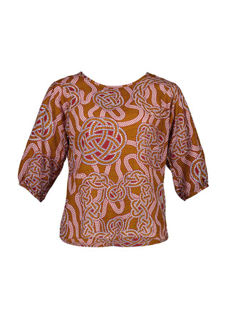 Olga de Polga seersucker blouse in the Love knots print with deep caramel brown and accents of blue and red. Front view