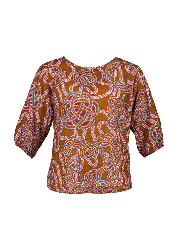 Olga de Polga seersucker blouse in the Love knots print with deep caramel brown and accents of blue and red. Front view