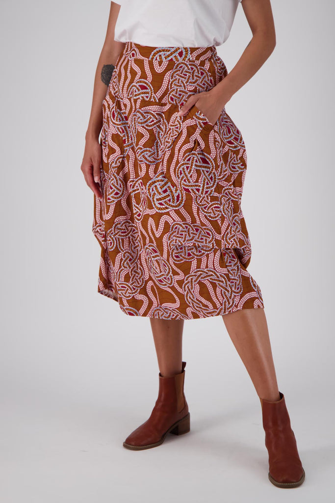 Olga de Polga printed Milwaukee skirt in fine cotton corduroy. Slouchy skirt with a unique shape anf large pockets. The skirt has an elasticated back waistband for extra comfort. Front close up view