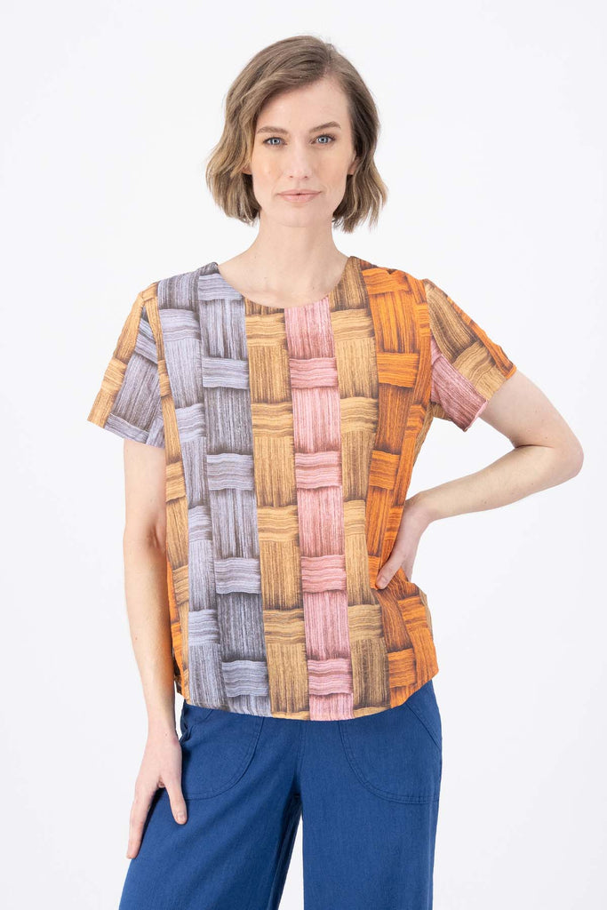 Olga de Polga top in Matador printed cotton seersucker. Short sleeves, round neck, boxy fit. Front view on model.