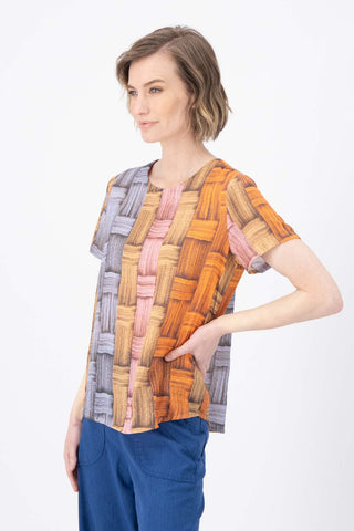 Olga de Polga top in Matador printed cotton seersucker. Short sleeves, round neck, boxy fit. side view on model.