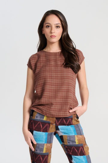 Olga de Polga Ella tee in brown Mocha brushed cotton seersucker. Cap sleeves, round neckline, tapers in at the waist. Front view on model.