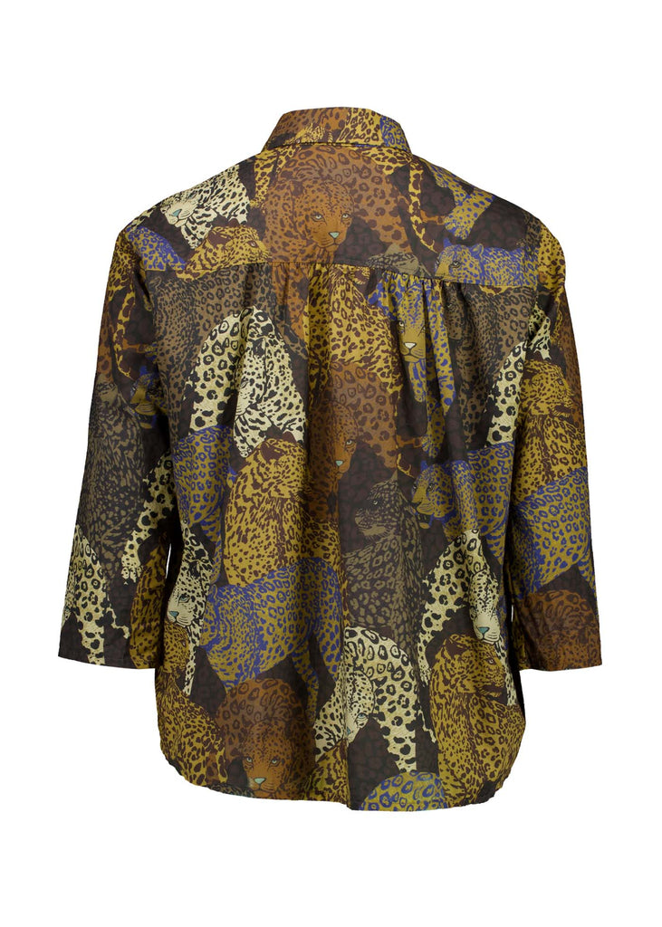 Olga de Polga classic shirt in Sabana printed cotton. Animal print in brown tones. Button down shirt with a collar and 3/4 length sleeves. Boxy fit with a nice drape. Back