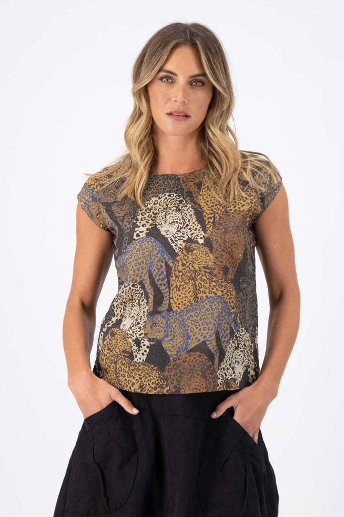 Olga de Polga Sabana tee in cotton seersucker. Animal print. Round neck and cap sleeves. Front view on model.