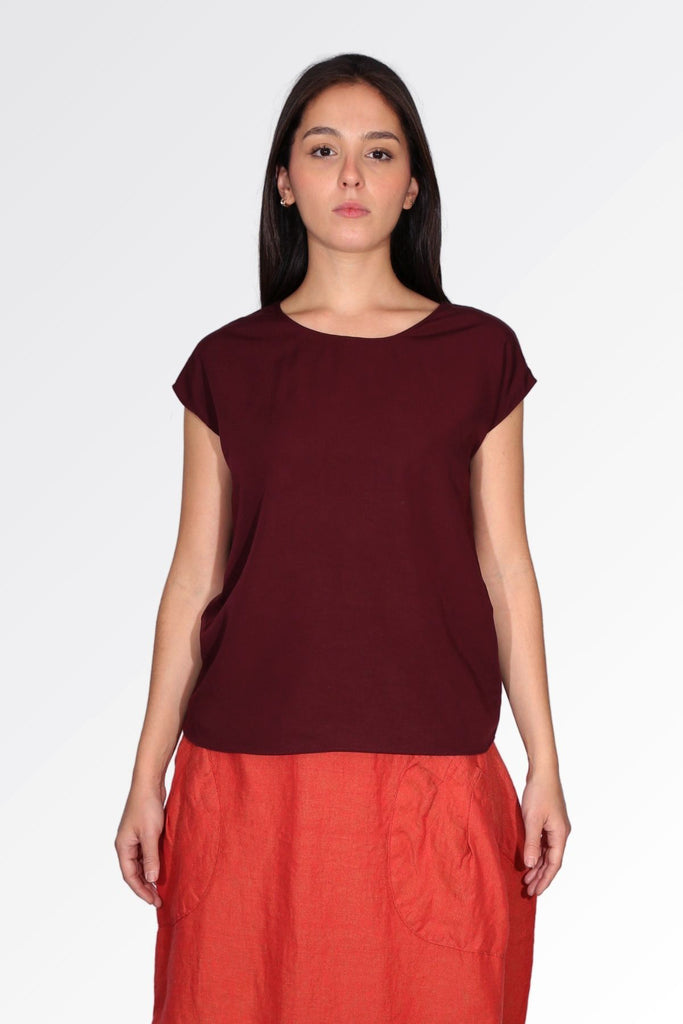 Olga de Polga maroon claret silk soft Tencel tee. 100% Tencel. Also comes in Smokey Grey. Front view on model