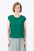 Olga de Polga dark green Skyscraper tee in 100% tencel with a slight sheen. Crew neckline, cap sleeves, and finishes at the hip. Front close-up view on model.