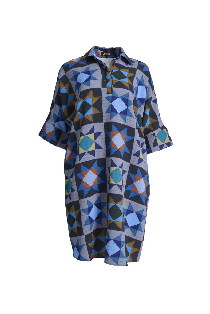Olga de Polga Estilo dress in Veda Night printed heavy crepe. Shift dress with a collar and button front at the neck. Half sleeves. Finishes at the knee depending on height. Front view