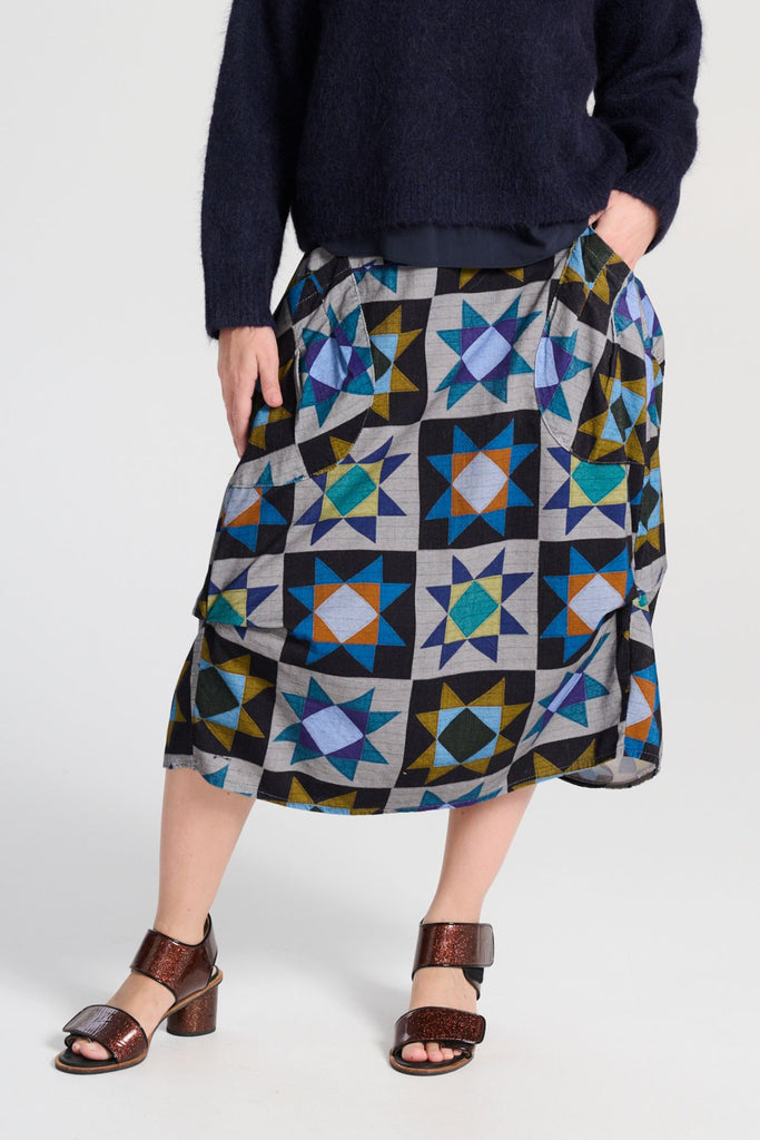 Olga de Polga Veda Milwaukee Skirt.  Comfy waistband making it the perfect throw-on-and-go! Close up view on model