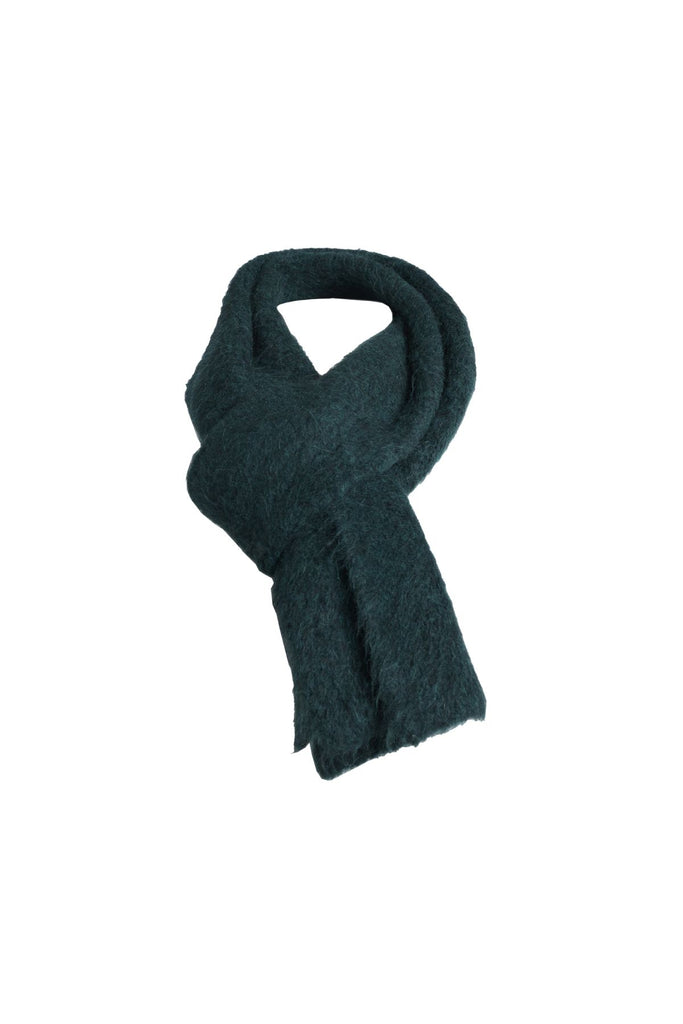 Olga de Polga Teal Aspen knit scarf in alpaca. Forest Green. Crafted for warmth and timeless style, this luxuriously soft alpaca-blend scarf is a must-have for the cooler months. 