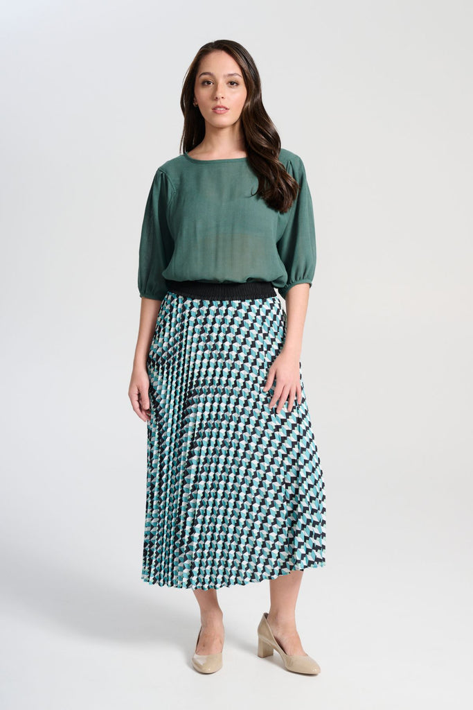 Olga de Polga Ava blouse in Forest Green viscose crepe. A mid-wight viscose crepe with a beautiful drape.  Wide neckline, half length lantern sleeves. Unique armhole shape.  Front full view on model