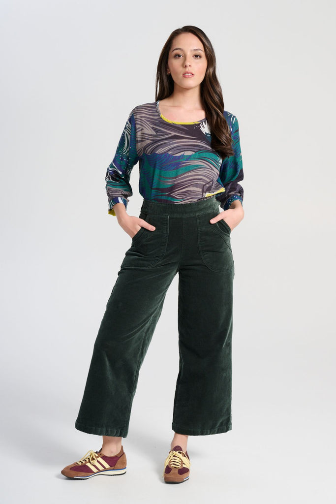Olga de Polga Peggy Paris pants in soft cotton velvet. Cropped length. Large pockets, super comfy waistband and side zip. High waisted and very flattering on all body types. Front full length view