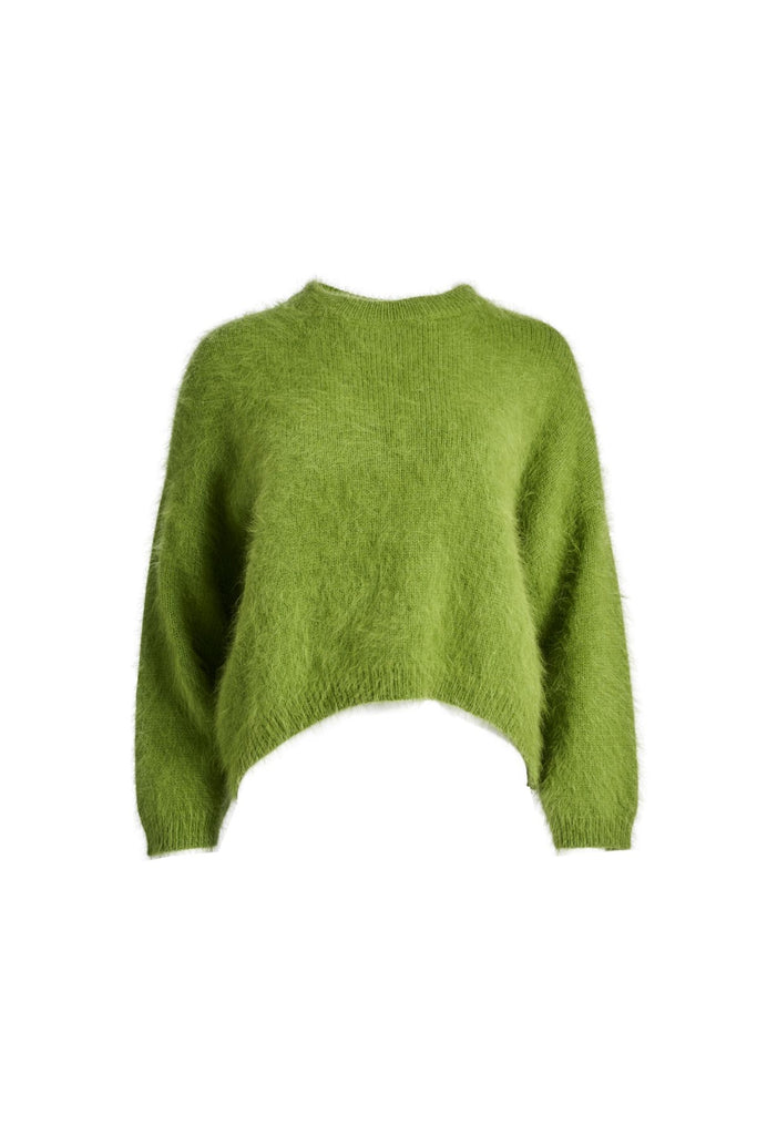 Olga de Polga angora knit sweater in Apple Green. The knit features a ribbed round neckline, drop shoulder and cropped length, so it is perfect with jeans and skirts. The fit is slightly oversized with a boxy cut and long sleeves. Front view