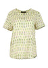 Olga de Polga Green Lime Ibiza printed Top. Short sleeves and a round neckline. This top finishes at the hip. Front view.