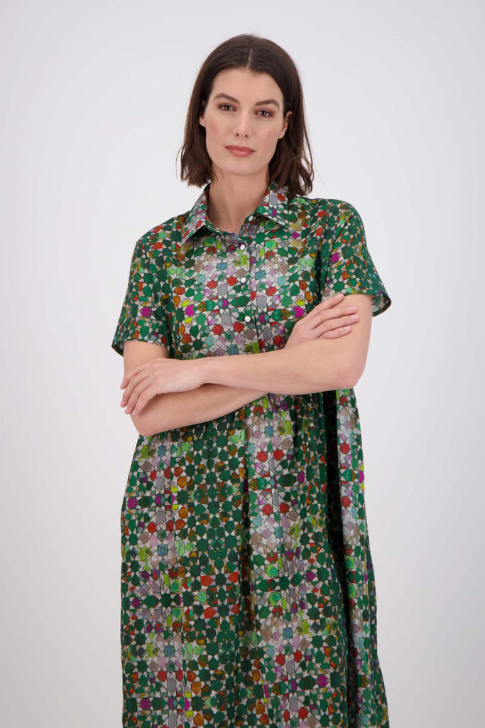 Olga de Polga Green Villa dress long in cotton Shirt dress with a button down front and short sleeves. Finishes just below the knee. Front close up view on model.