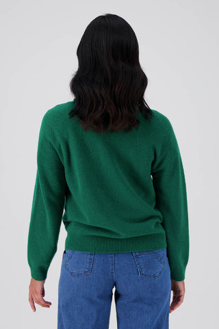 Green Olga de Polga Kyoto cardigan in a wool cashmere blend. With a round neckline and long sleeves, this cardigan has a button down front with small unique buttons. Back view