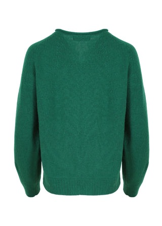 Green Olga de Polga Kyoto cardigan in a wool cashmere blend. With a round neckline and long sleeves, this cardigan has a button down front with small unique buttons. Back