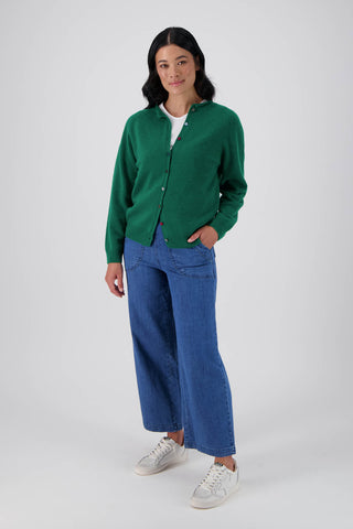 Green Olga de Polga Kyoto cardigan in a wool cashmere blend. With a round neckline and long sleeves, this cardigan has a button down front with small unique buttons.  Front full length view