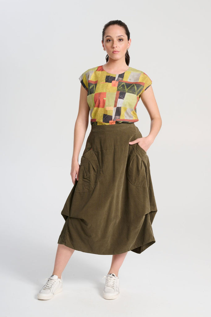 Olga de Polga green Olive Milwaukee Marlowe skirt in fine cotton cord. Front view on model. 