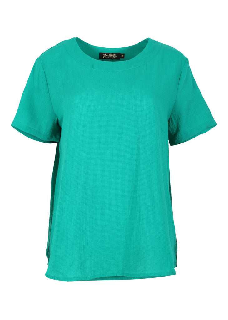 Olga de Polga classic top in Pacific Parakeet Green cotton seersucker. With a round neckline and short sleeves. This top finishes at the hip. Front view