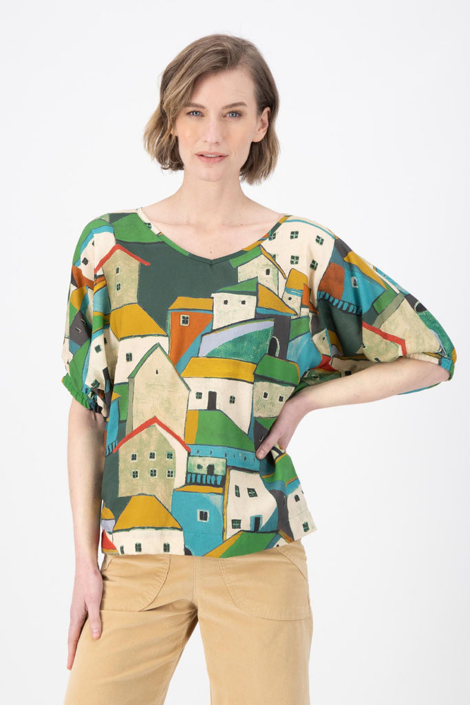 Olga de Polga Camisa batwing sleeved blouse in Pueblito Green printed Tencel. Front close view on model.