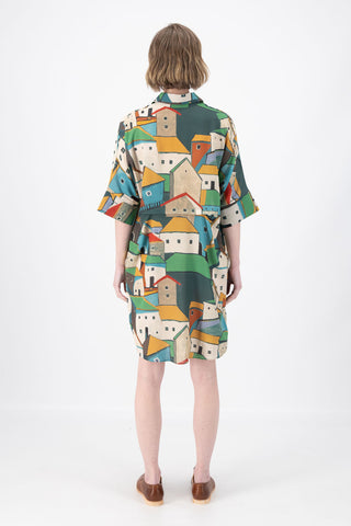 Olga de Polga Estilo shift dress in Pueblito Green printed Tencel mix fabric. Back view on model.