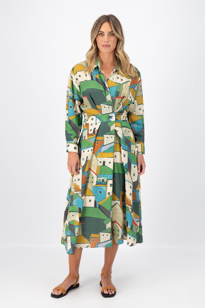 Olga de Polga Green Pueblito parisian wrap dress in 100% viscose with long sleeves and an elasticated back waist. Midi length. Front view on model.