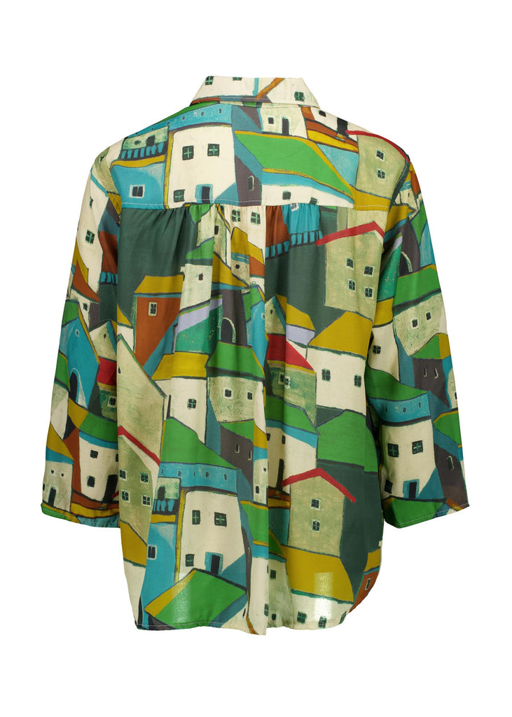 Green Pueblito printed viscose shirt with a button down front and 3/4 sleeves. Finishes at the hip.  Back view.