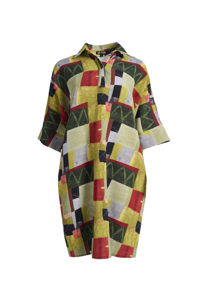 Olga de Polga shift shirt dress in green Sage Kismet print. Classic shift silhouette with a flattering collar and half sleeves.
Front button opening at neckline. Front view
