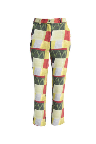 Olga de Polga green printed Pantalon pants in Kismet Sage. The Pantalon is a straight-legged pant that reaches the lower ankle, featuring a button and zip closure at the front with an elasticised back waistband for added comfort. Front view