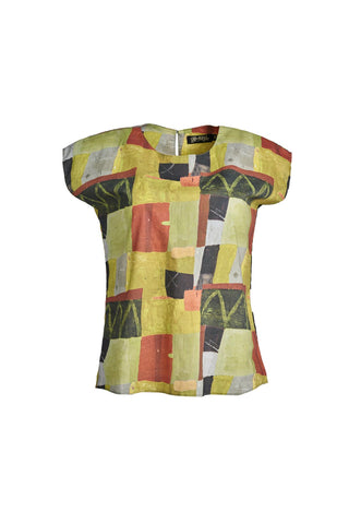 Olga de Polga tee in Sage Kismet printed soft wash cotton. Round neckline, cap sleeves. Tapers in slightly at the waist.  Front view