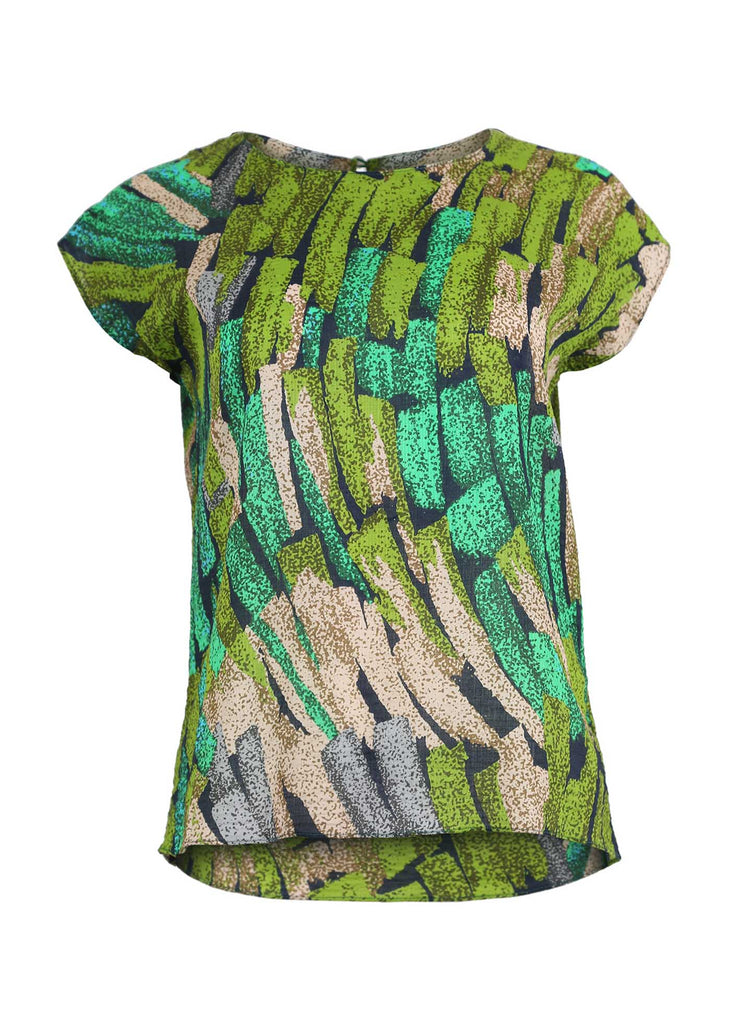 Olga de Polga classic tee in Green Vivant printed cotton seersucker. With cap sleeves and a round neckline, this tee finishes at the hip. Front view.