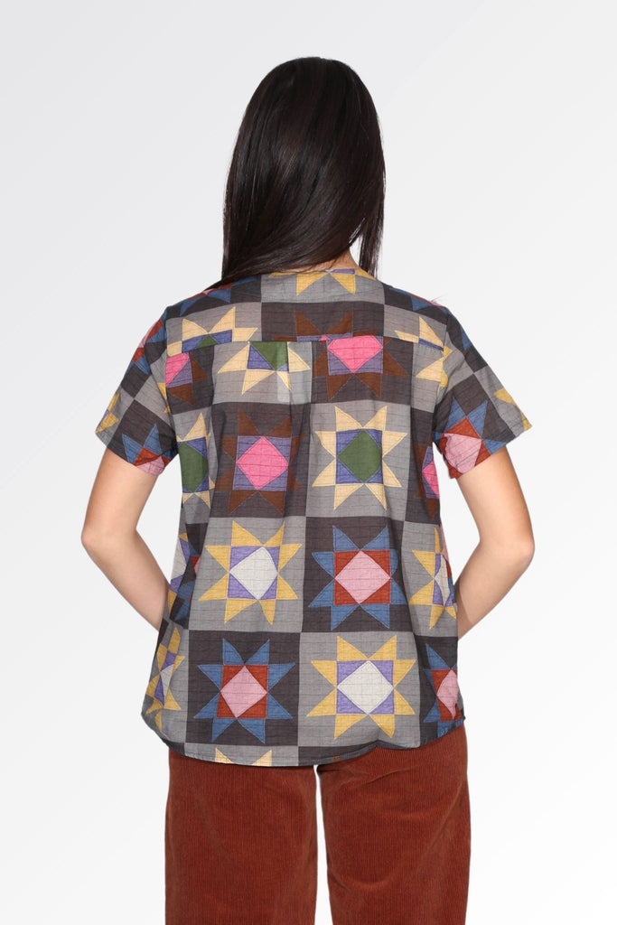 Olga de Polga Buchra Top in grey geometric printed cotton. Back view on model