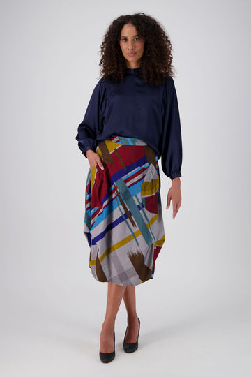 Olga de Polga Milwaukee skirt in the new Primary Crossroads printed cotton cord. Front view on model