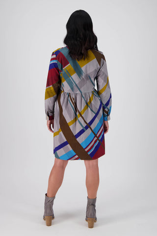 Olga de Polga new style - tunic dress in the Crossroads Primary printed cotton corduroy.  Back view on model
