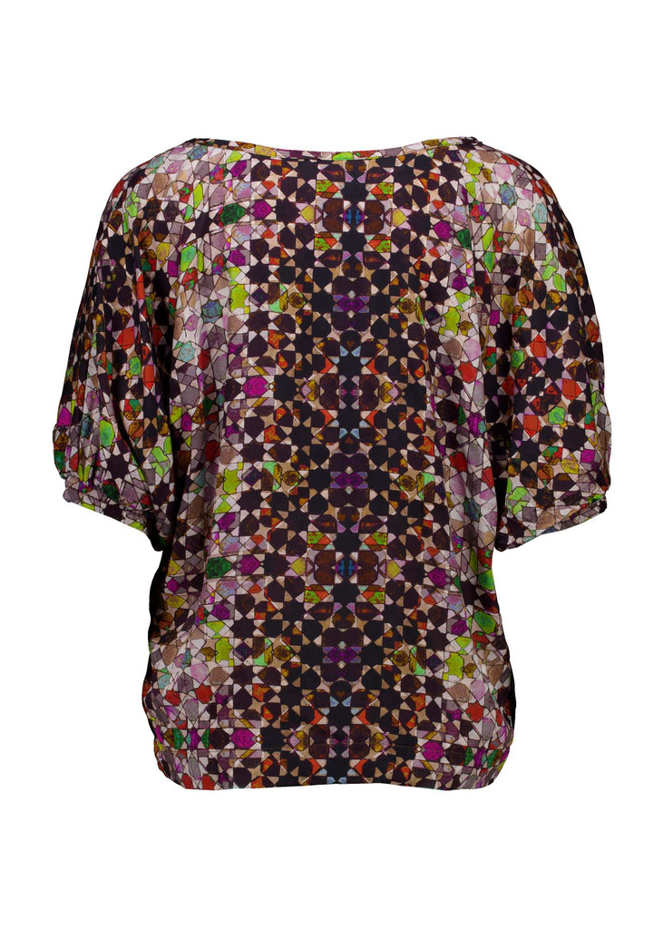 Olga de Polga Grey Kaleidoscope Camisa blouse in fine Tencel fabric. a reversible bat-winged blouse with short sleeves and is great for everyday wear. Back view.