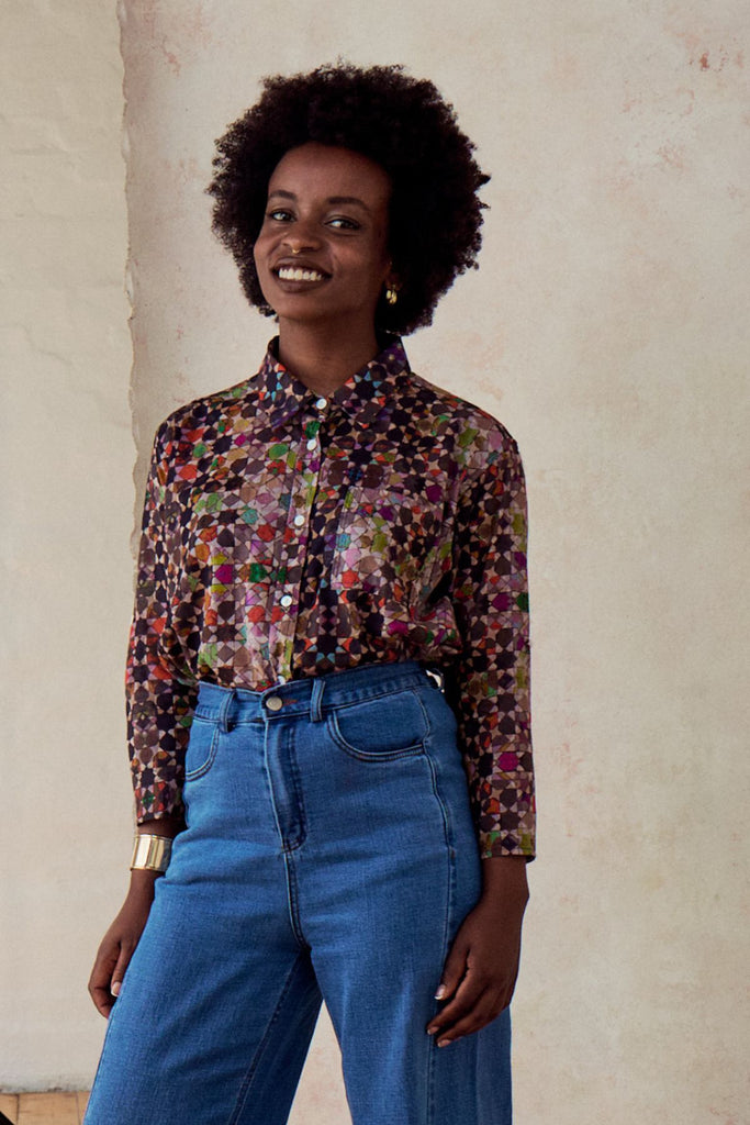 Olga de Polga cotton shirt in the Grey Kaleidoscope core print. Front close up view on model.