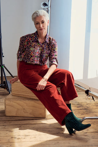 Olga de Polga cotton shirt in the Grey Kaleidoscope core print. Front view on model with Peggy cords.