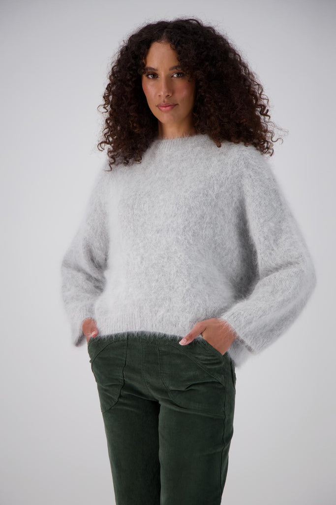 Olga de Polga silver grey angora sweater. front view on model