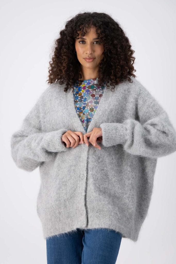 Olga de Polga long, cosy alpaca To the Moon and Back cardigan, with a button front and extra long sleeves. Front