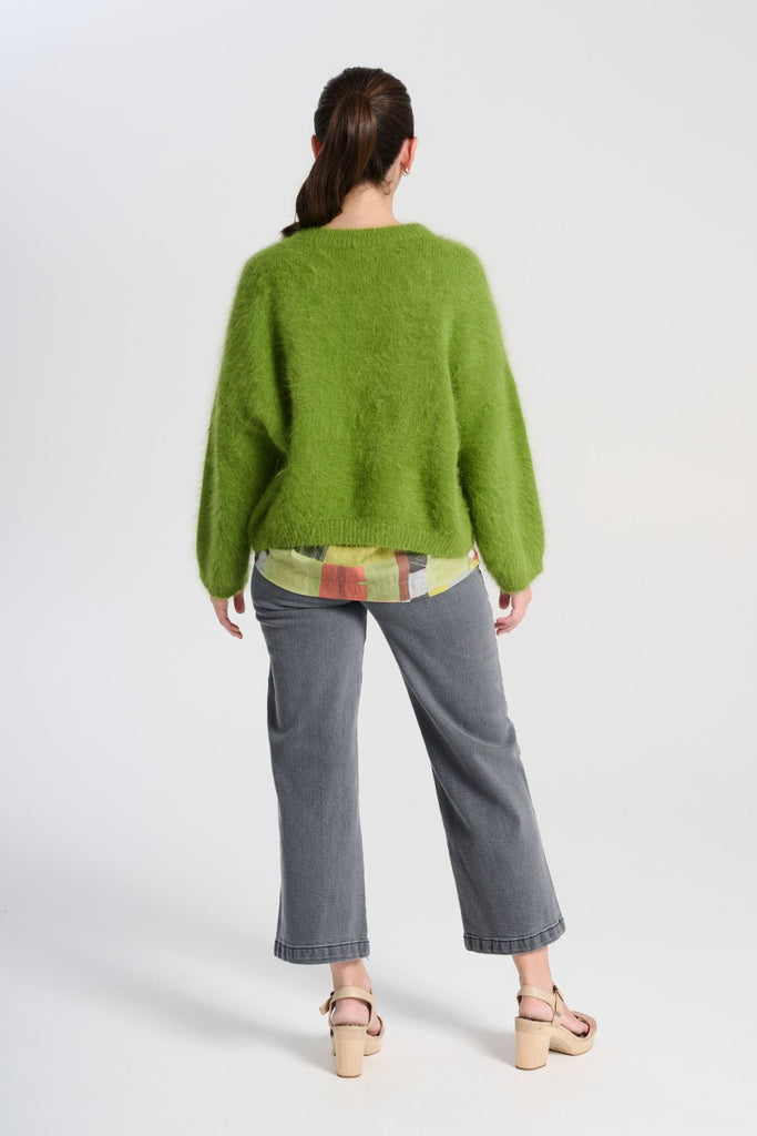 Olga  de Polga Peggy jeans in Grey Wash denim. Original cropped length. Large front patch pockets. Back view on model