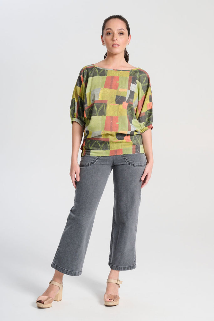 Olga  de Polga Peggy jeans in Grey Wash denim. Original cropped length. Large front patch pockets. Front view on model.