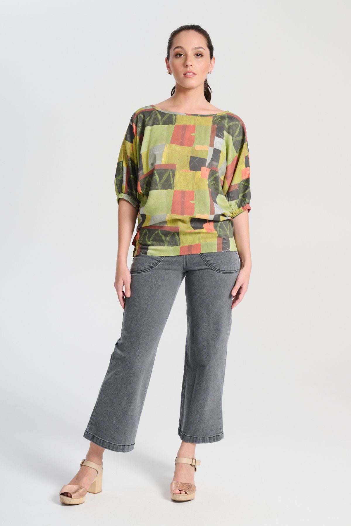 Olga  de Polga Peggy jeans in Grey Wash denim. Original cropped length. Large front patch pockets. Front view on model.