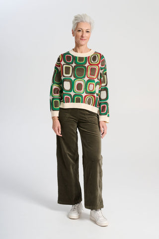 Olga de Polga Peggy Paris soft velvet pants in Khaki in long length. Large front patch pockets. Comfy elastic back waist. Also available in a cropped length. Front view on model.