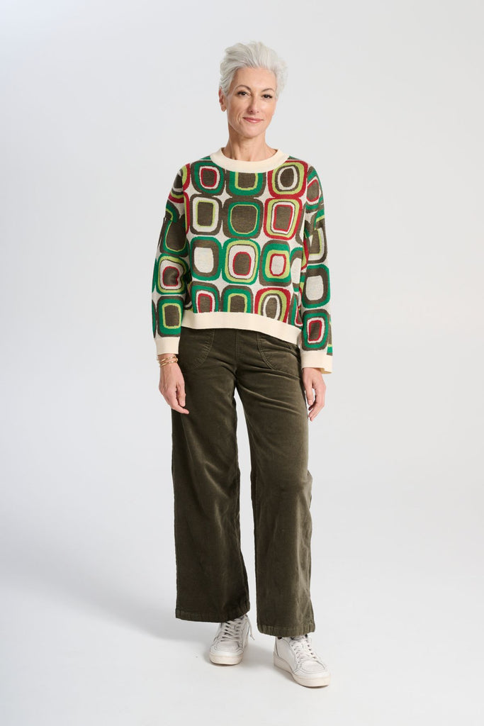 Olga de Polga Peggy Paris soft velvet pants in Khaki in long length. Large front patch pockets. Comfy elastic back waist. Also available in a cropped length. Front view on model.