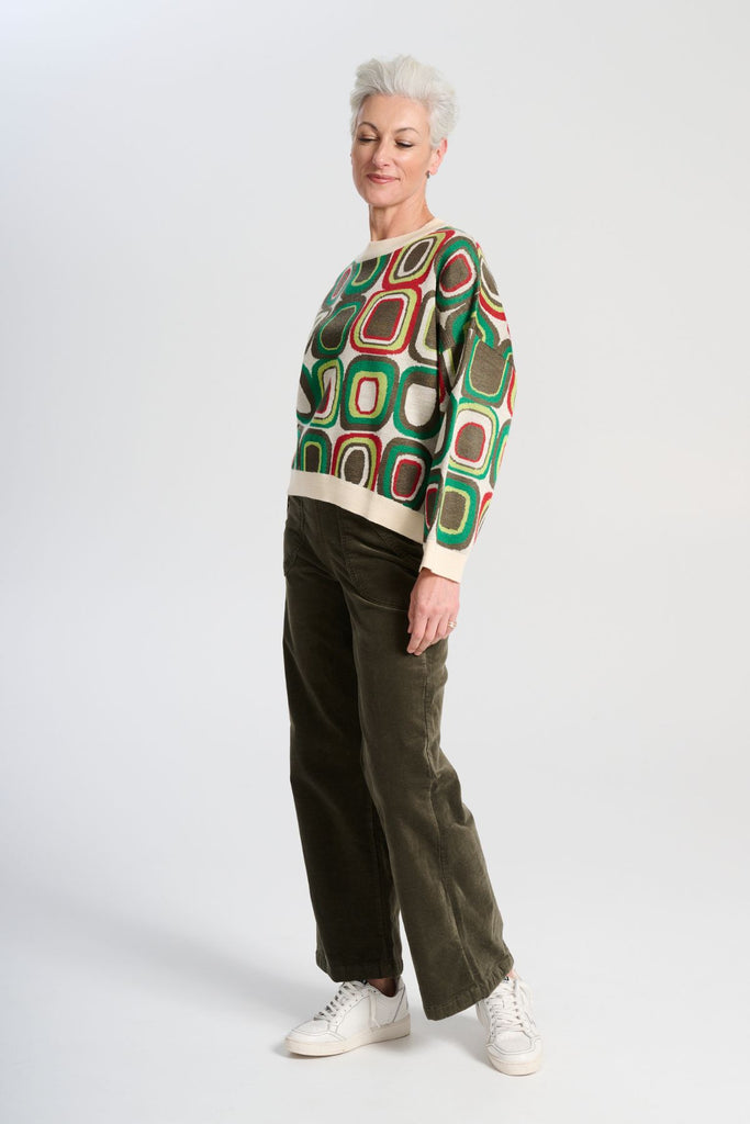 Olga de Polga Peggy Paris soft velvet pants in Khaki in long length. Large front patch pockets. Comfy elastic back waist. Also available in a cropped length. Side view on model