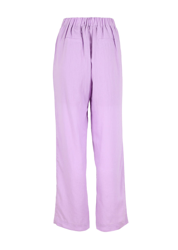 Olga de Polga Lilac Boheme Splendour Trousers are a classic, wear-everywhere linen trouser. With an elasticated back waist. Back View.