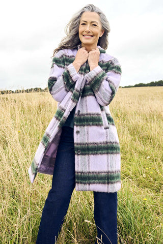 Olga de Polga Lilac Highland coat in wool and recycled polyester. Front view on model
