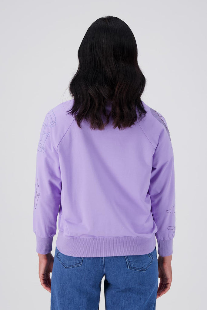 Olga de Polga Lilac Montage sweatshirt in a cotton tencel blend. Ribbing at the neck, cuffs and hem.  Back view on model