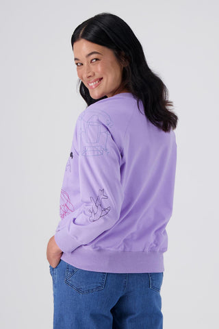 Olga de Polga Lilac Montage sweatshirt in a cotton tencel blend. Ribbing at the neck, cuffs and hem.  Side back on model