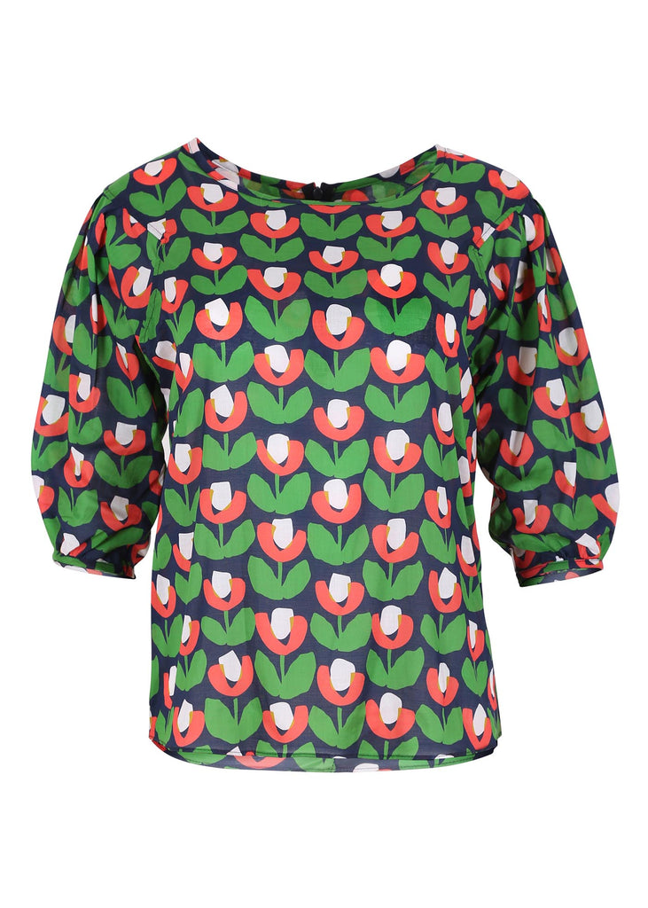 Olga de Polga blouse in Marit floral print. Green and blue. Boat neckline and half sleeves. Front view.